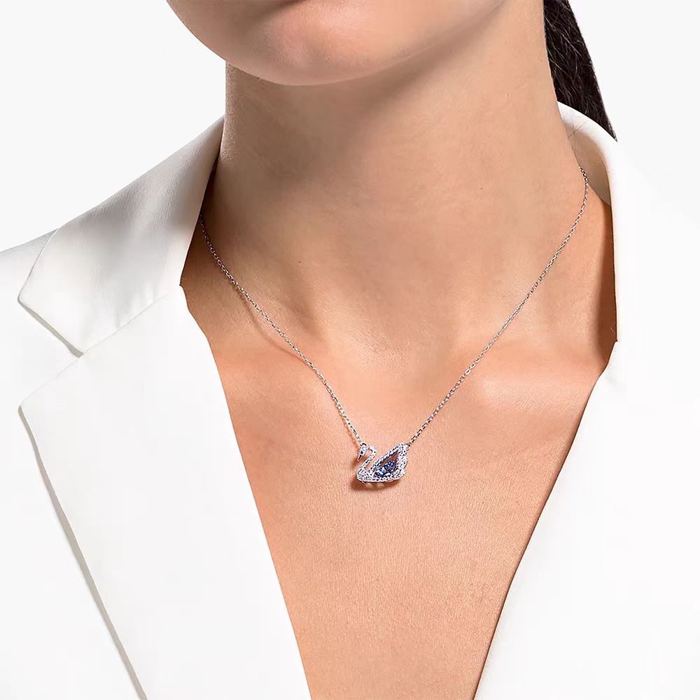 SWAROVSKI Dancing Swan Necklace Jewelry Collection, Rhodium Finish, Blue Crystals, Clear Crystals